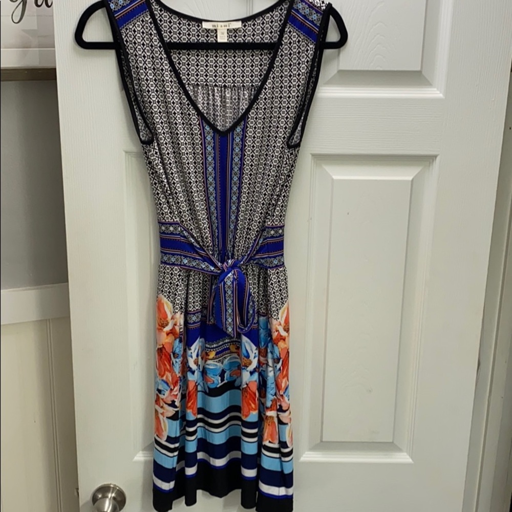 Floral/ geometric print dress size M